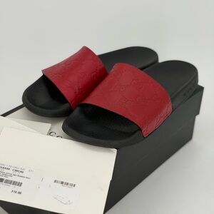 Gucci Red and Black Embossed Slides